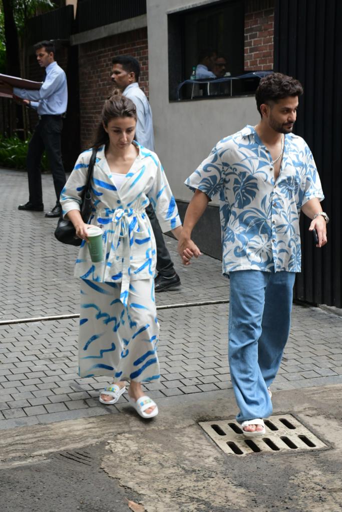 What caught the eye was not only their palpable chemistry but also their impeccable sense of coordination in their outfits. Their clothing choices seemed to mirror each other's style.